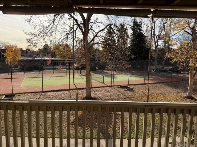 a view of a yard with a car park