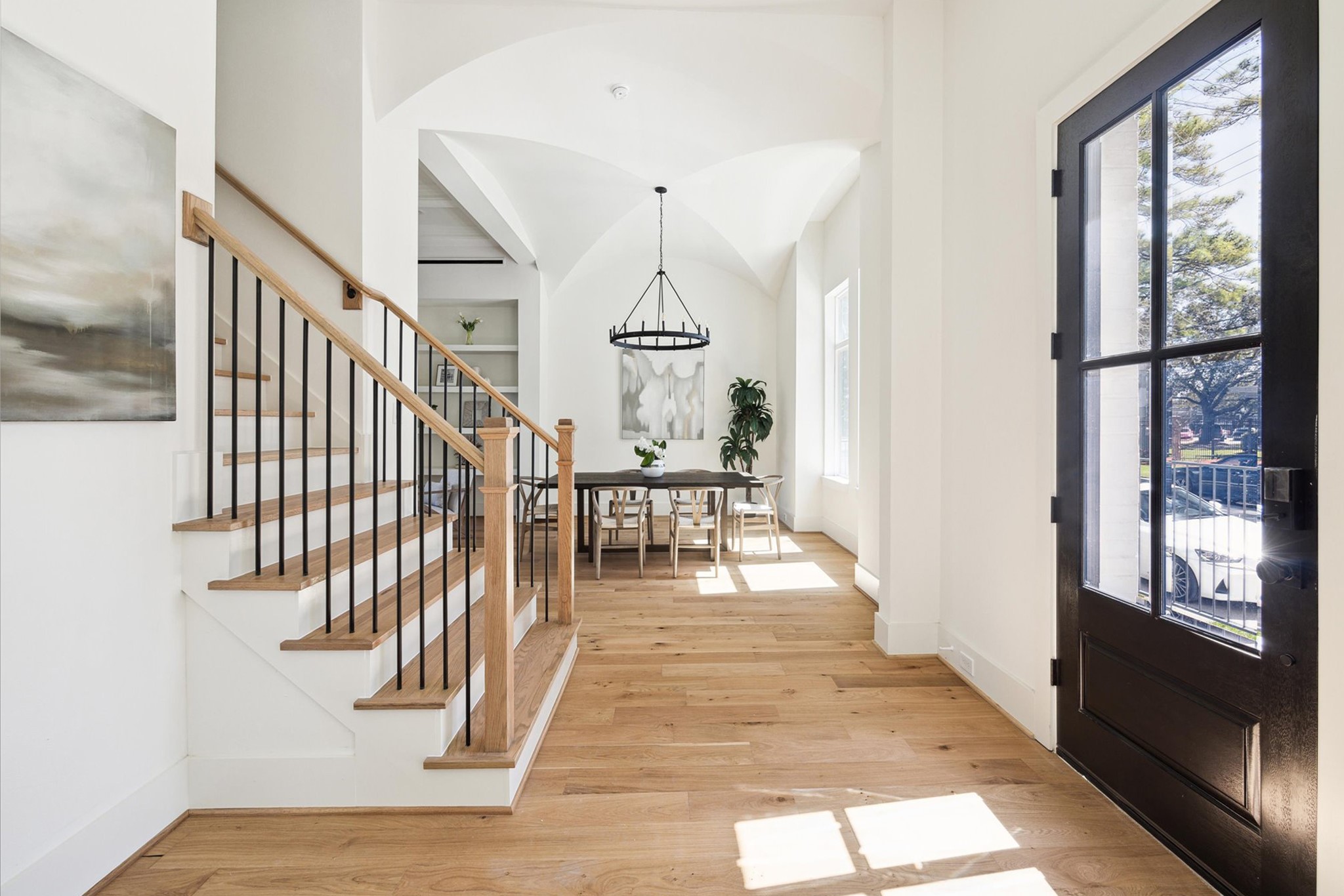 5309 Lambeth Riverside Drive Houston, TX 77091 - Photo 5 of 29 a view of entryway and hall with wooden floor