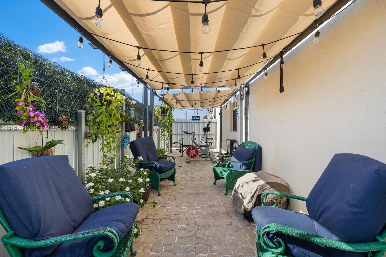 11501 Southwest 228th Lane Miami, FL 33170 - Photo 41 of 44 a living room with furniture and flowers
