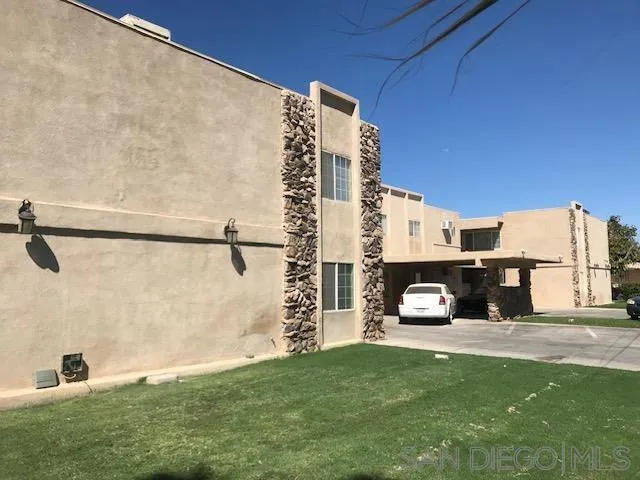 a car parked in front of a house