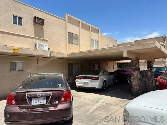 155 G Street Brawley, CA 92227 - Photo 6 of 11 a car parked in front of a building