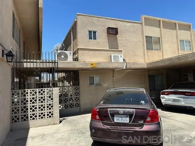a car parked in front of a building