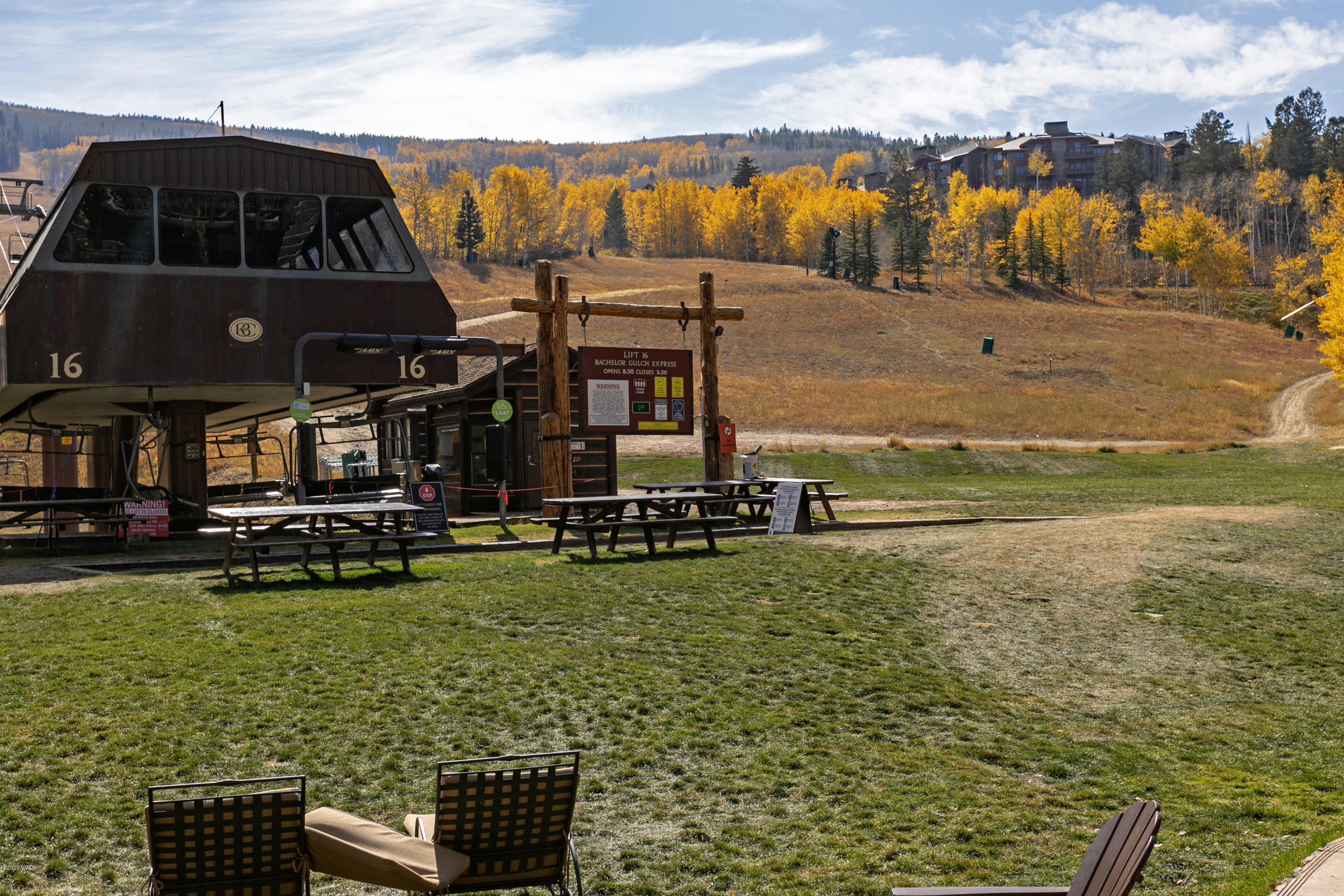 130 Daybreak Ridge Road, Unit R906 Avon, CO 81620 - Photo 25 of 26 a view of a lake with a house