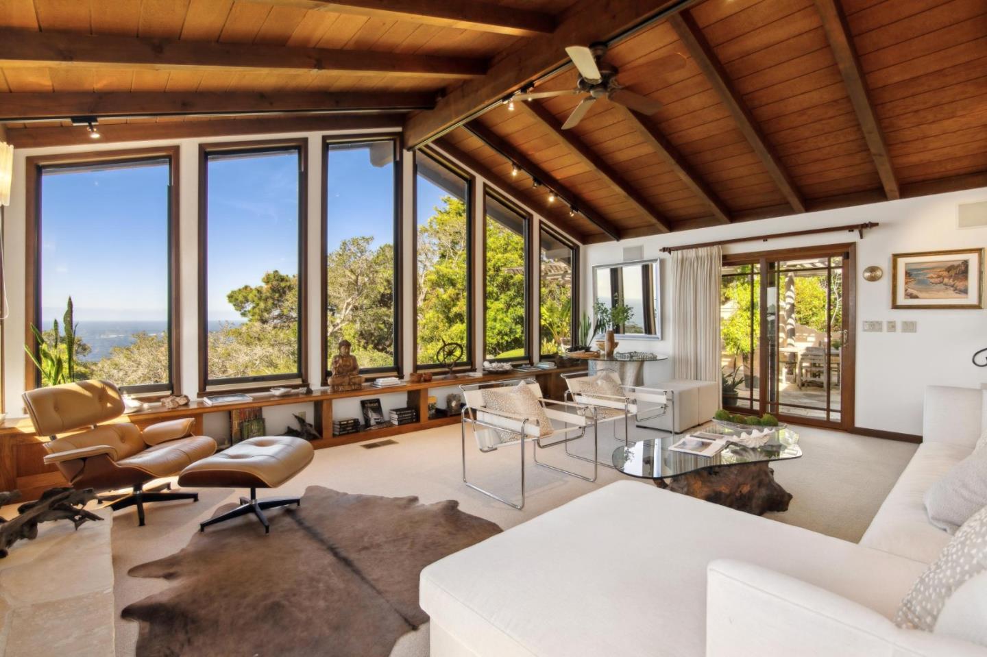 139 Boyd Way Carmel, CA 93923 - Photo 12 of 65 a living room with furniture large windows and wooden floor