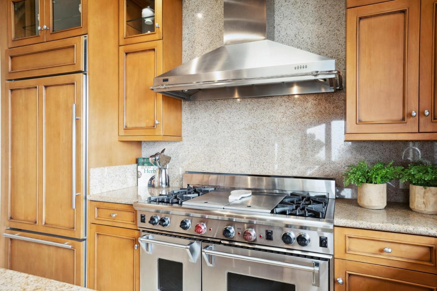 139 Boyd Way Carmel, CA 93923 - Photo 24 of 65 a kitchen with a stove and cabinets