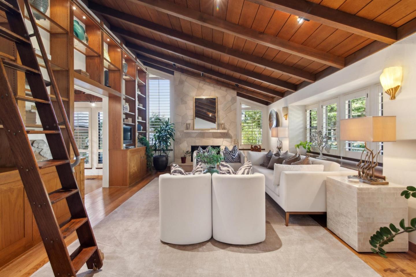 139 Boyd Way Carmel, CA 93923 - Photo 30 of 65 a living room with furniture a fireplace and a large window