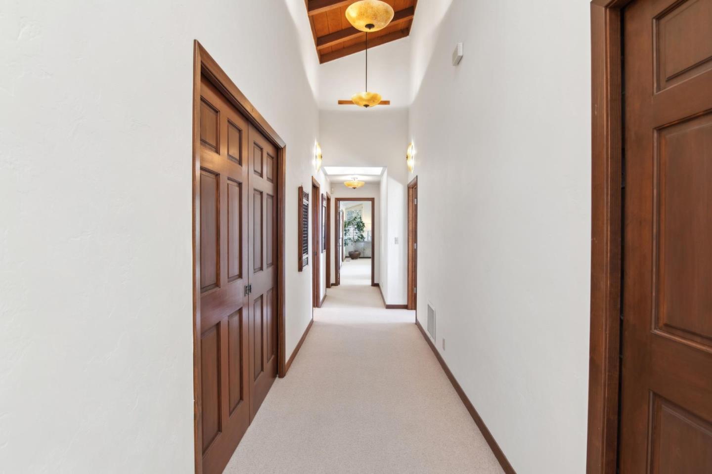 139 Boyd Way Carmel, CA 93923 - Photo 32 of 65 a view of a hallway with windows