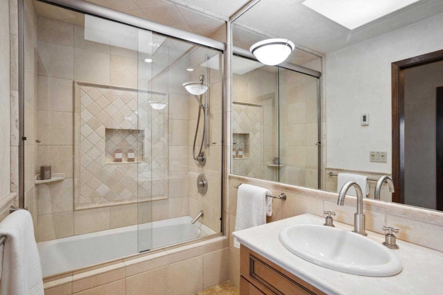 139 Boyd Way Carmel, CA 93923 - Photo 44 of 65 a bathroom with a sink and a mirror