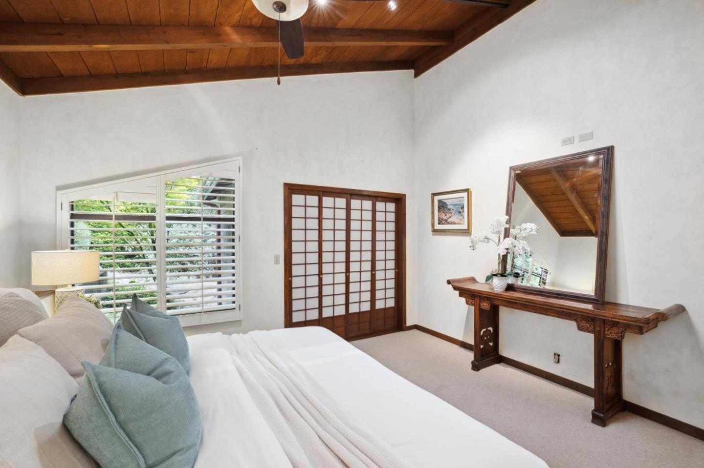 139 Boyd Way Carmel, CA 93923 - Photo 46 of 65 a bedroom with a bed and a large window