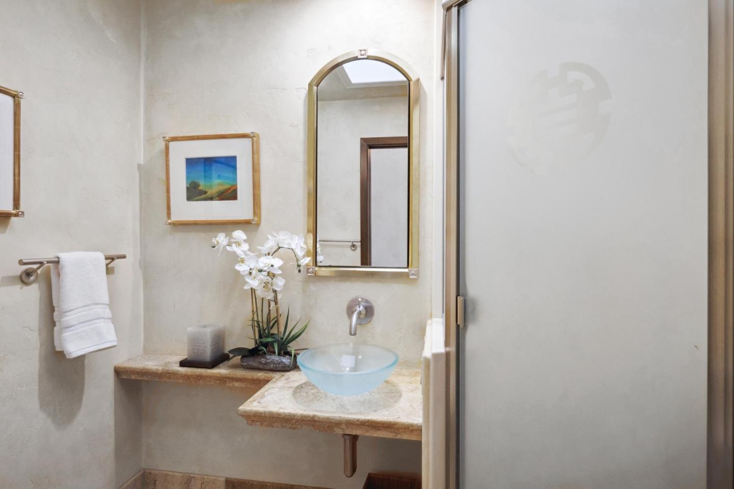 139 Boyd Way Carmel, CA 93923 - Photo 47 of 65 a bathroom with a sink and a mirror