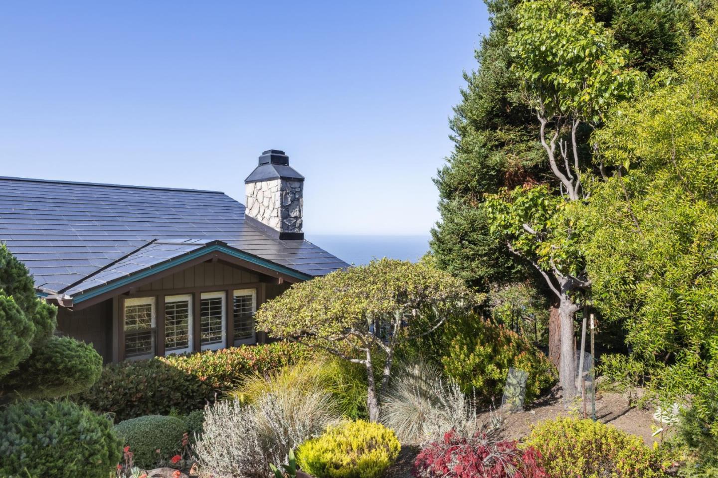 139 Boyd Way Carmel, CA 93923 - Photo 6 of 65 a front view of a house with a yard and plants