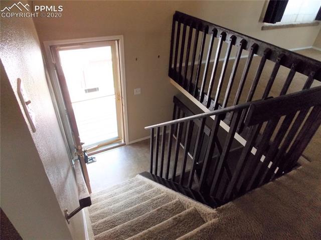 6375 Bismark Road Colorado Springs, CO 80922 - Photo 4 of 24 Split level entry.