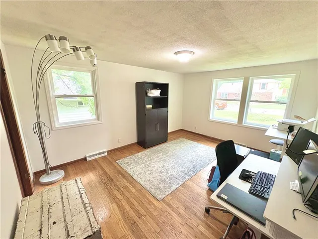 $335,000 | 6607 Northwest Quail Run Drive, Kansas City, MO 64152