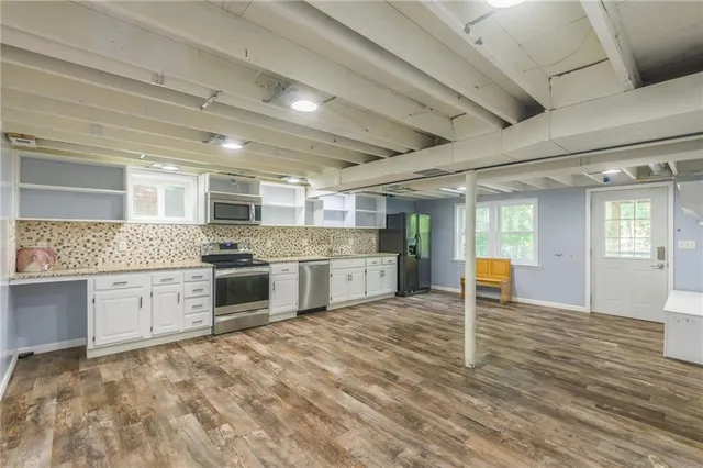 $335,000 | 6607 Northwest Quail Run Drive, Kansas City, MO 64152