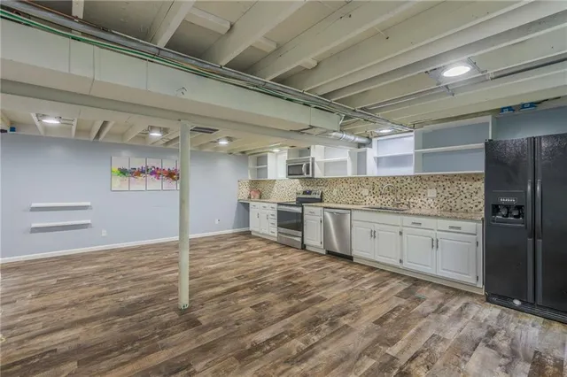 $335,000 | 6607 Northwest Quail Run Drive, Kansas City, MO 64152