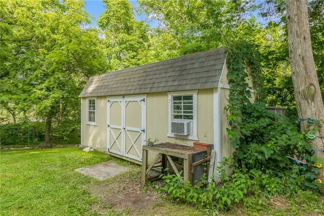 $335,000 | 6607 Northwest Quail Run Drive, Kansas City, MO 64152