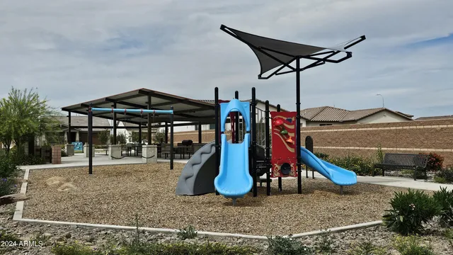 a view of a yard with a slide