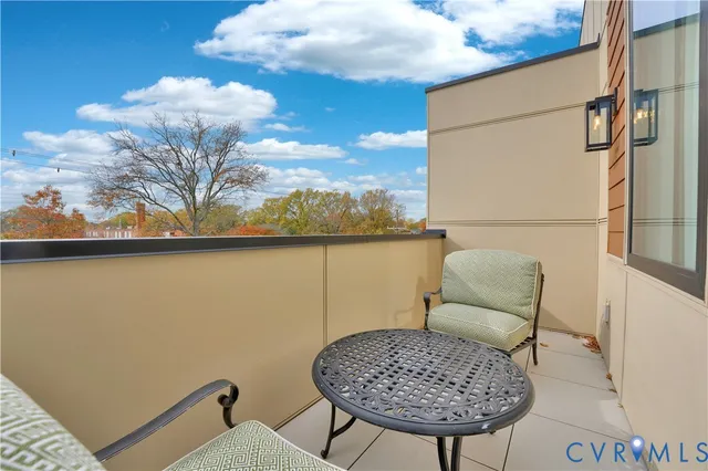 a view of balcony with furniture