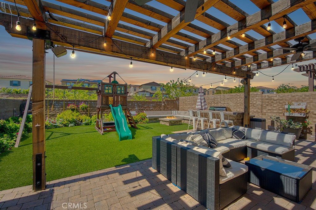 91 Baculo Street Rancho Mission Viejo, CA 92694 - Photo 1 of 1 a view of yard from deck with patio