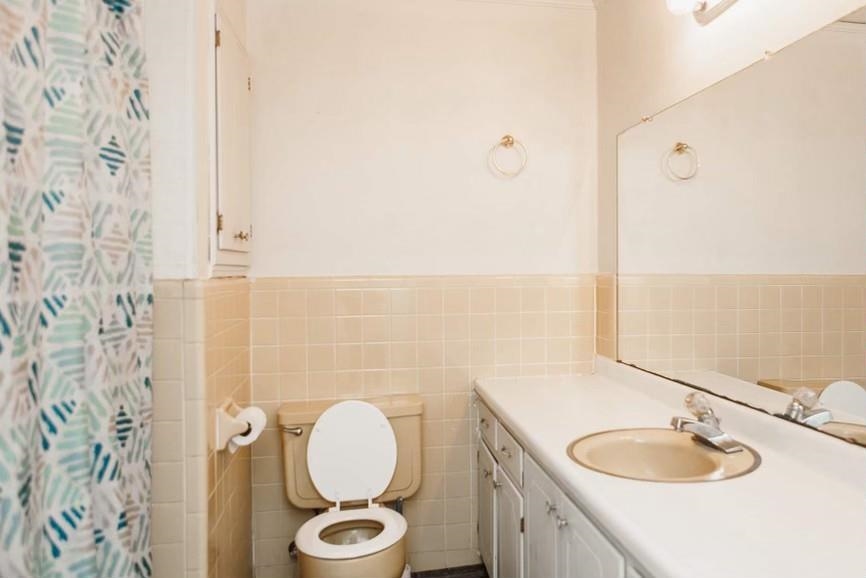 457 Maple Circle Hickory Flat, MS 38633 - Photo 12 of 24 a bathroom with a granite countertop sink and a mirror