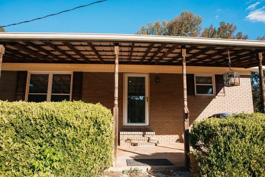 457 Maple Circle Hickory Flat, MS 38633 - Photo 15 of 24 a view of a house with a window and brick walls