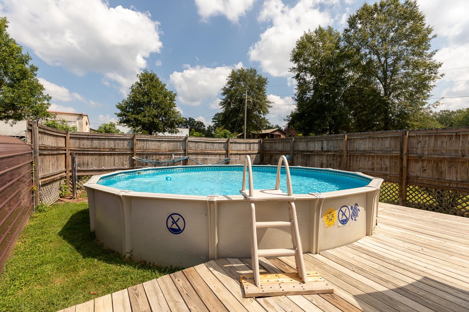 457 Maple Circle Hickory Flat, MS 38633 - Photo 18 of 24 a view of a swimming pool with a patio