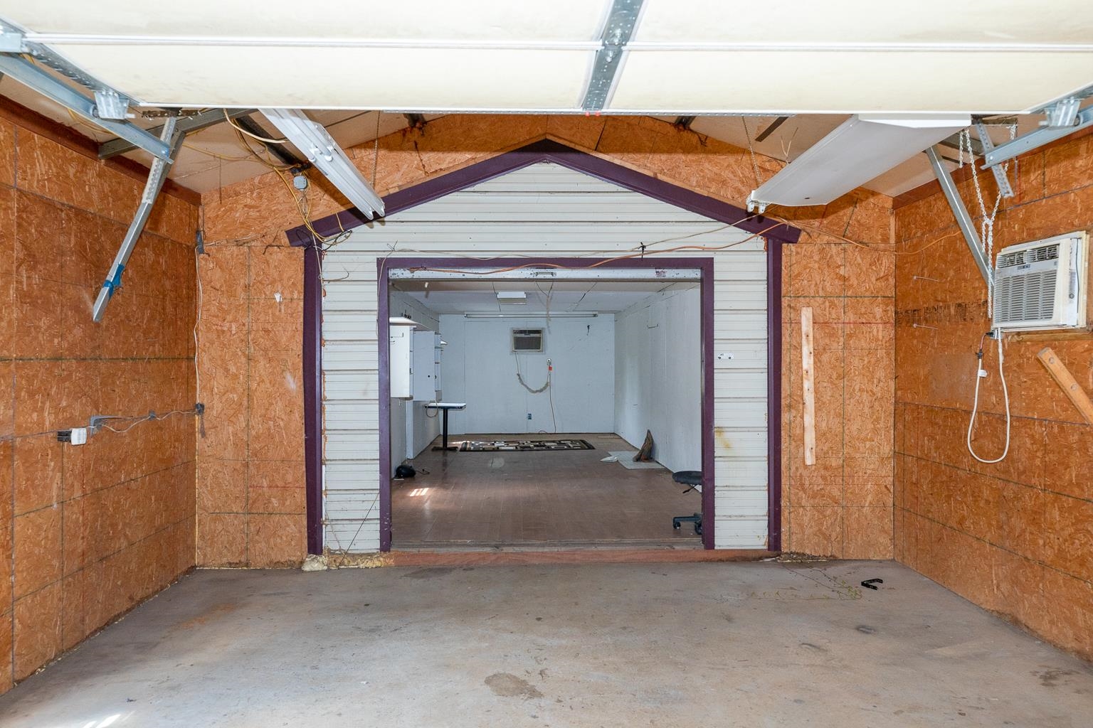 457 Maple Circle Hickory Flat, MS 38633 - Photo 21 of 24 a view of a car garage of the house