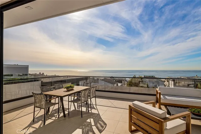 a living room with lots of furniture and a rug