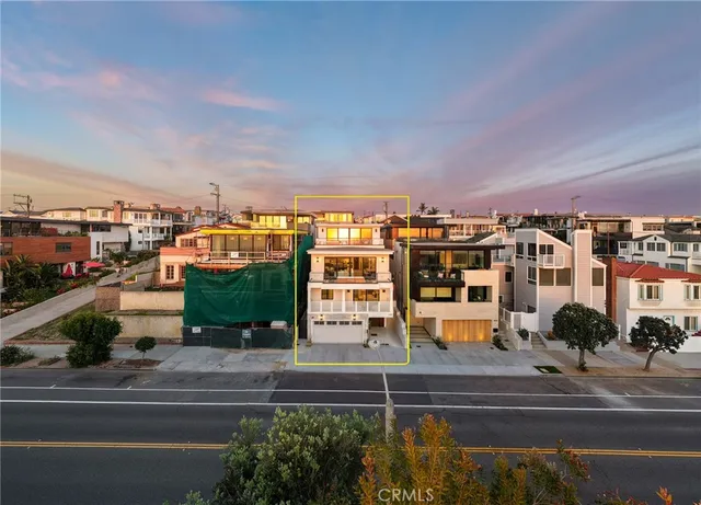 a front view of a house with a garage