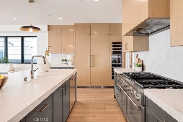 a bathroom with double vanity sinks and a mirror