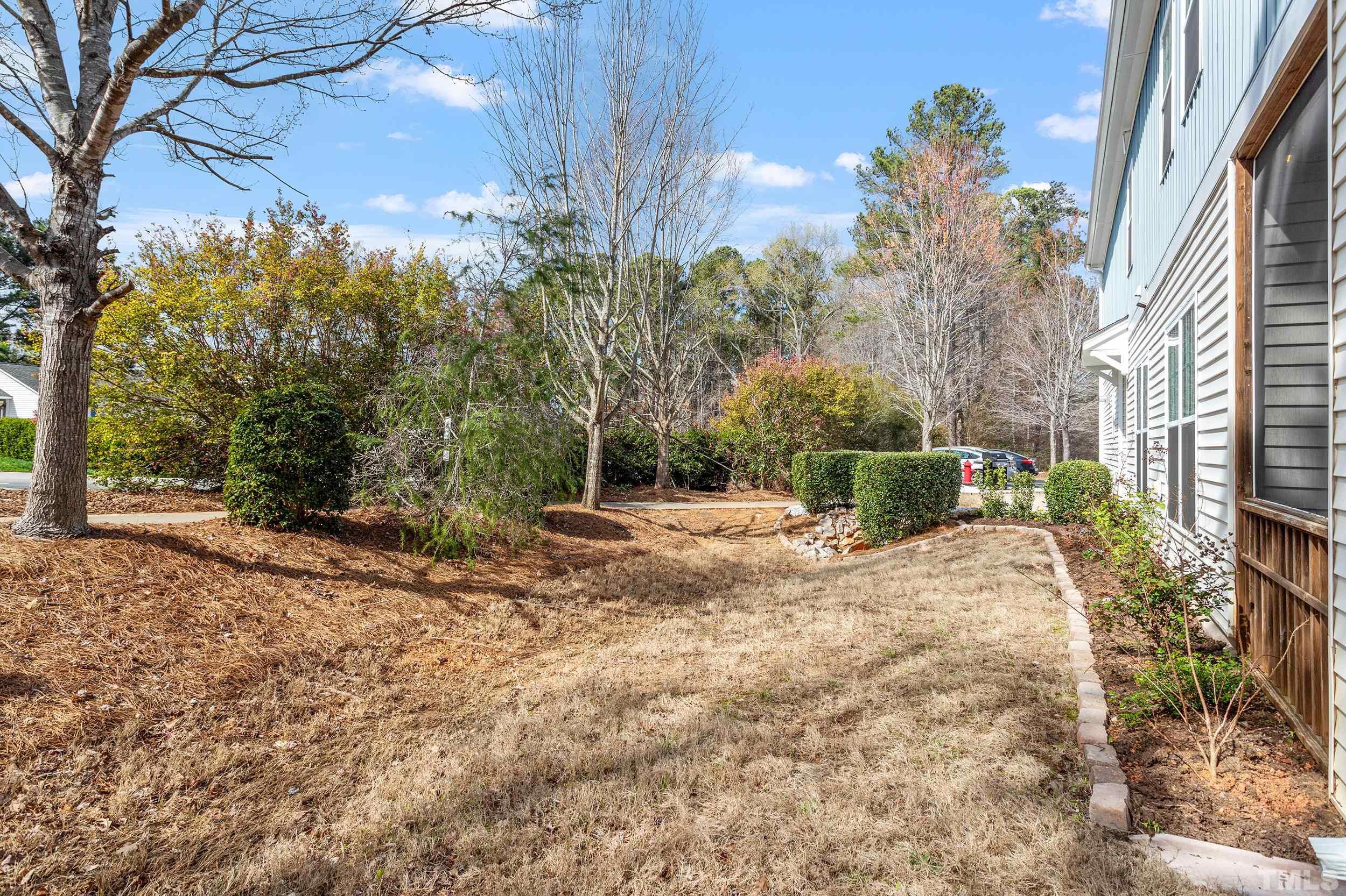 2463 Memory Ridge Drive Raleigh, NC 27606 - Photo 34 of 34 a view of backyard with green space