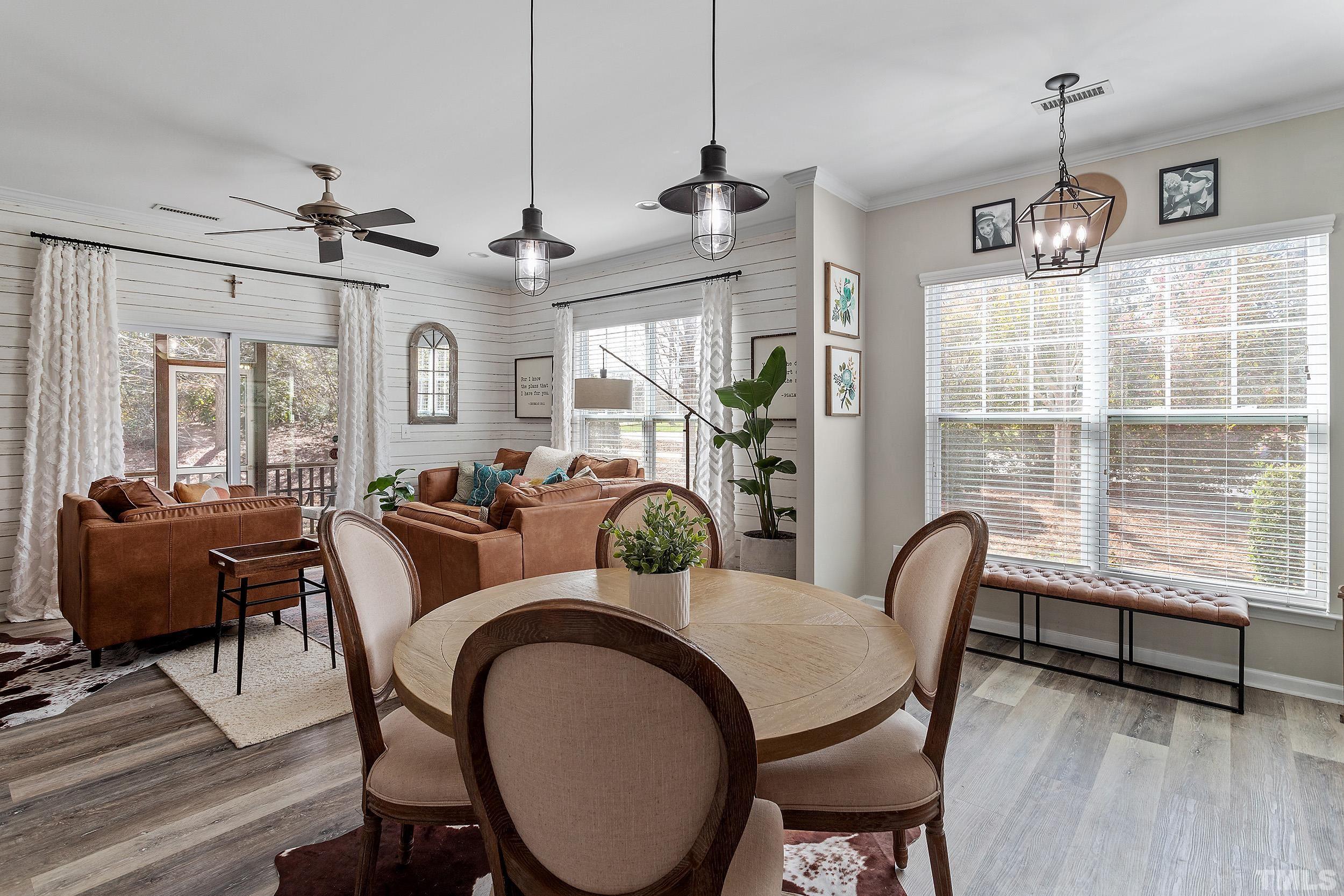 2463 Memory Ridge Drive Raleigh, NC 27606 - Photo 9 of 34 a view of a dining room with furniture window and wooden floor