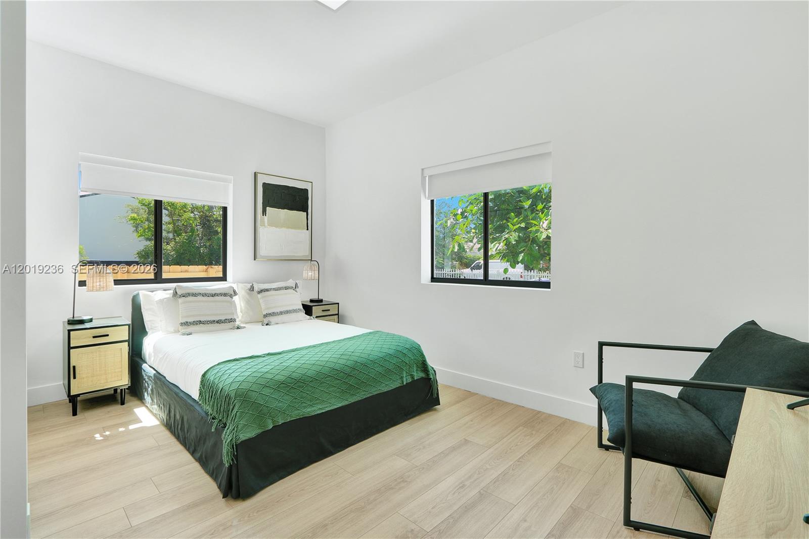 2001 Southwest 22nd Terrace Miami, FL 33145 - Photo 21 of 31 a bedroom with a large bed and a window