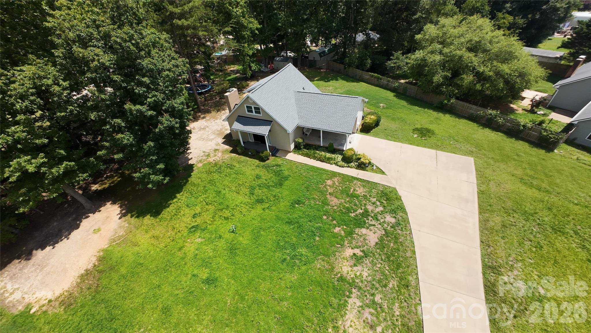 122 Rockman Road Grover, NC 28073 - Photo 39 of 45 a aerial view of a house with a yard and large trees