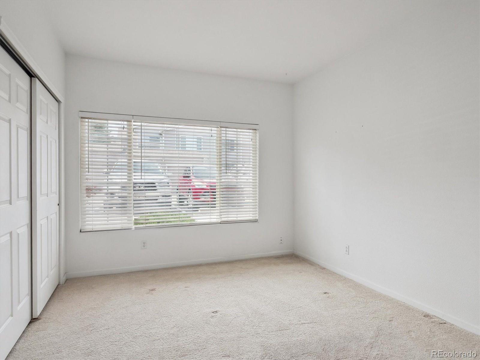 3855 East Canyon Ranch Road, Unit 104 Highlands Ranch, CO 80126 - Photo 15 of 18 an empty room with a window