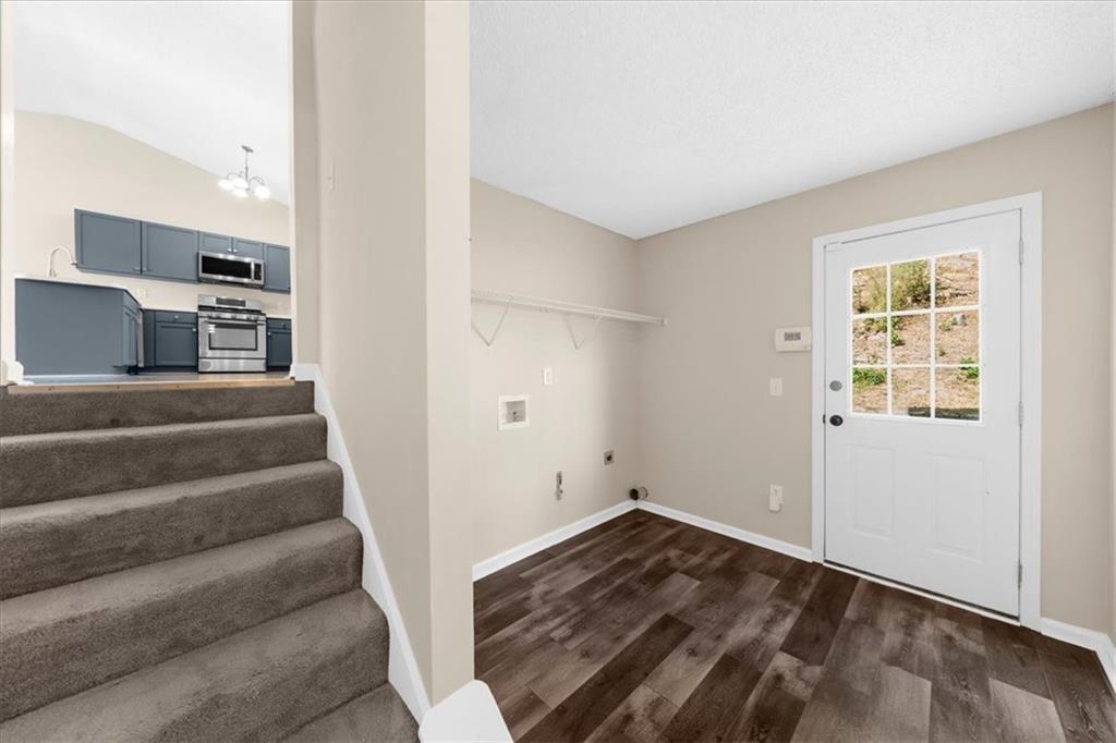 203 Bainbridge Way Dallas, GA 30132 - Photo 27 of 38 a view of entryway and hall with wooden floor