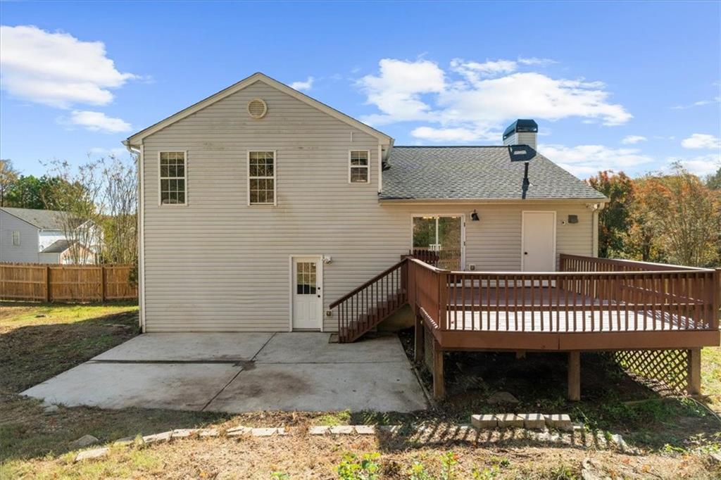 203 Bainbridge Way Dallas, GA 30132 - Photo 30 of 38 a view of a house with a roof deck
