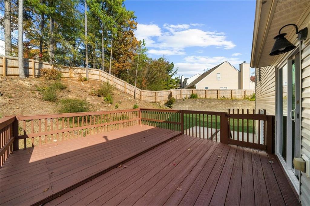 203 Bainbridge Way Dallas, GA 30132 - Photo 31 of 38 a view of a balcony with wooden floor