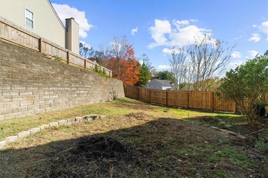 203 Bainbridge Way Dallas, GA 30132 - Photo 33 of 38 a view of a backyard