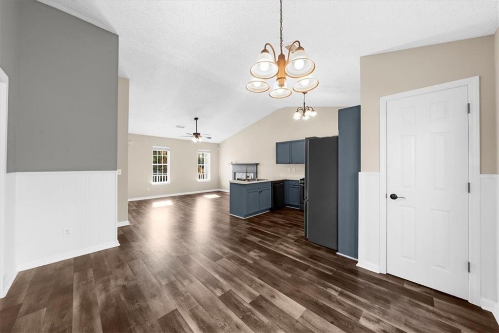 203 Bainbridge Way Dallas, GA 30132 - Photo 10 of 38 a view of a room with wooden floor and staircase