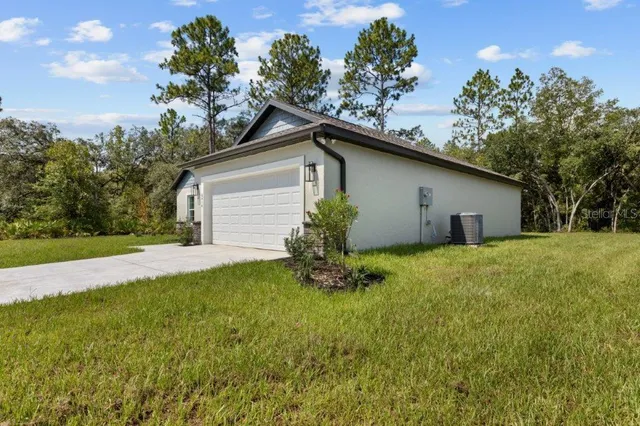 a house view with a garden space