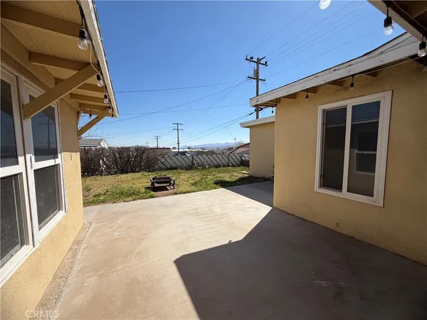 a view of a backyard of a house