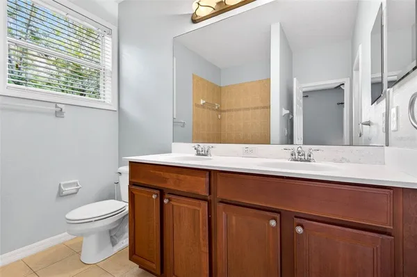 a bathroom with a tub and a shower