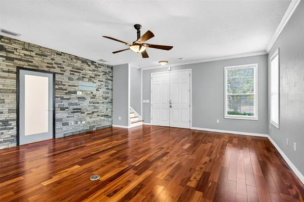 a kitchen with stainless steel appliances granite countertop a stove and cabinets