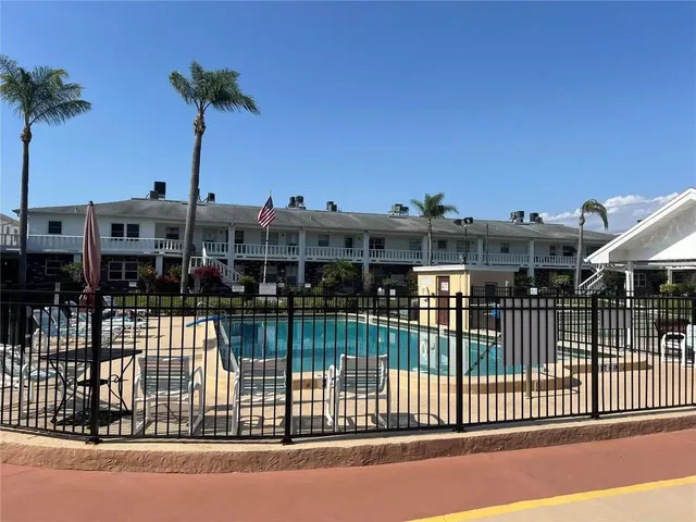 a view of a balcony with a lake view
