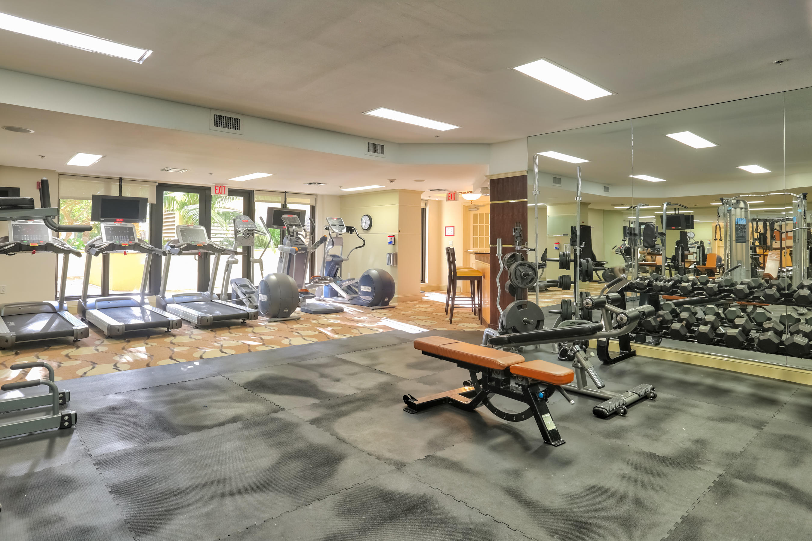 801 South Olive Avenue, Unit 120 West Palm Beach, FL 33401 - Photo 11 of 17 a view of a room with gym equipment