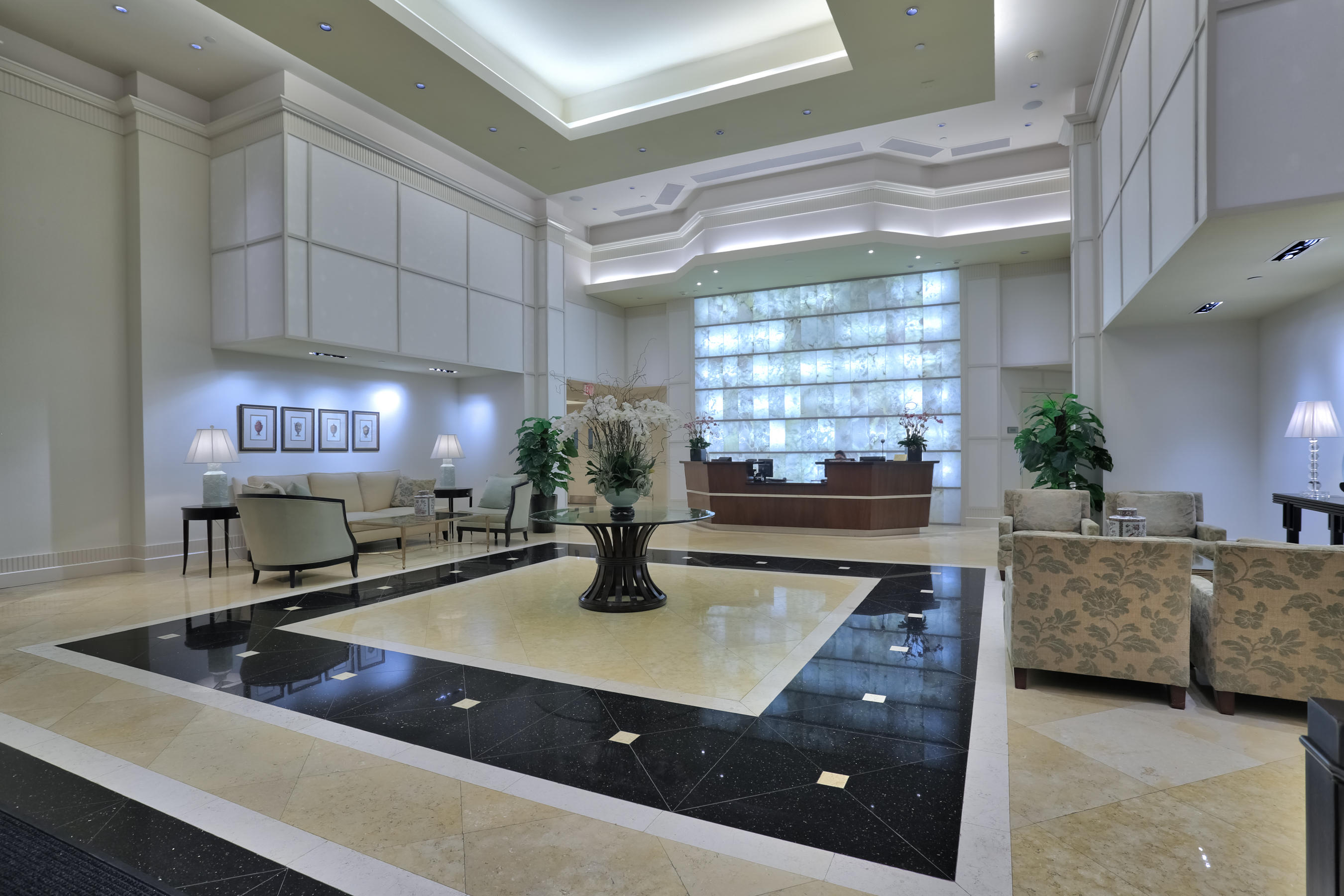 801 South Olive Avenue, Unit 120 West Palm Beach, FL 33401 - Photo 13 of 17 a kitchen with a sink counter top space and living room