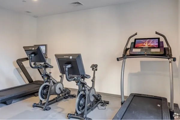 a view of a room with gym equipment