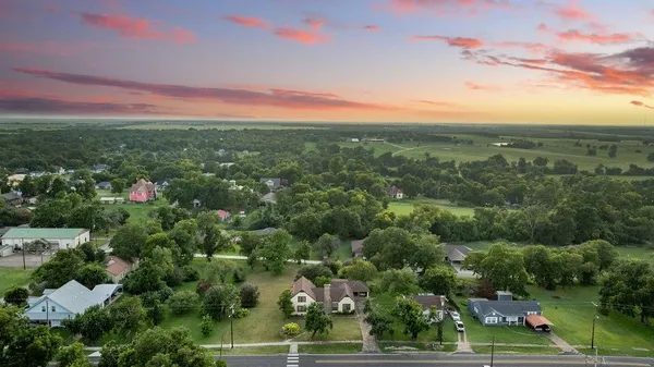 an aerial view of a city with lots of residential buildings
