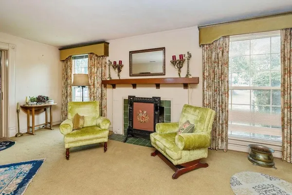 a living room with furniture and a table